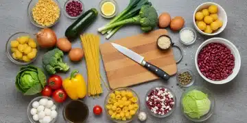 Mesa de cozinha com ingredientes frescos e baratos para cozinhar de forma econômica em 2026.