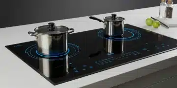 Modern induction cooktop glowing blue, symbolizing energy efficiency