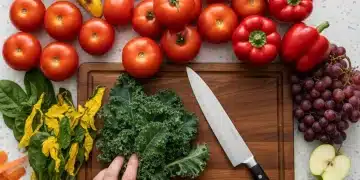 Assortment of fresh and slightly wilting produce on a kitchen counter, ready for creative cooking to extend their life.