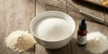 Assortment of sugar-free baking ingredients on a wooden table with baked goods.